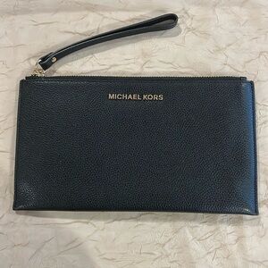 MICHAEL Michael Kors Jet Set Travel Black Clutch